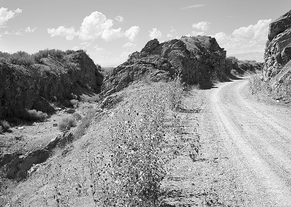 Unfinished  cut  Union  Pacific  RR  left, finished cut  Central  Pacific RR  right, Promontory  Mountains , Utah