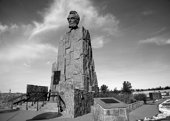 Monument   to  Abraham  Lincoln, !-80, desending into Laramie, Wyoming