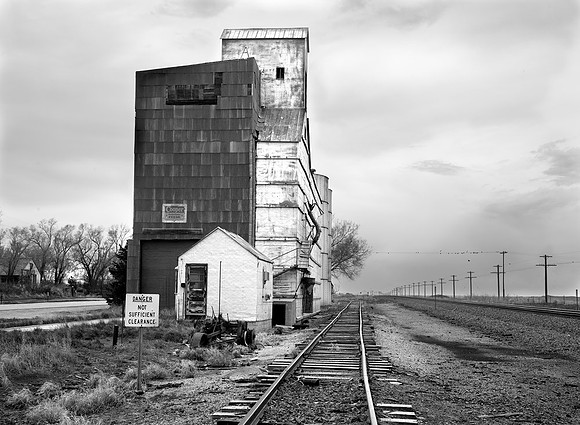 Abandoned grain  loading building, Hyw-30 near Clarks, Nebraska
