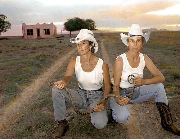 two women one snake