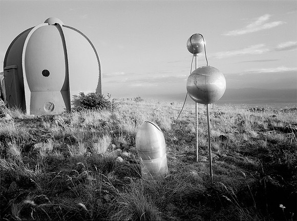 three electrically connected spheres