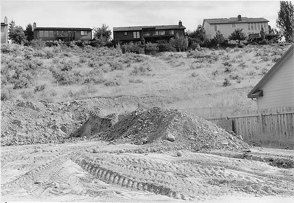 Trail emerging  from house  foundation, Boise, Idaho